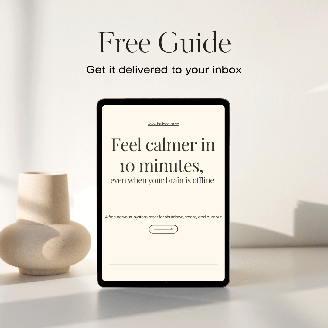 Tablet displaying a free adhd guide on calming techniques with a vase in the background