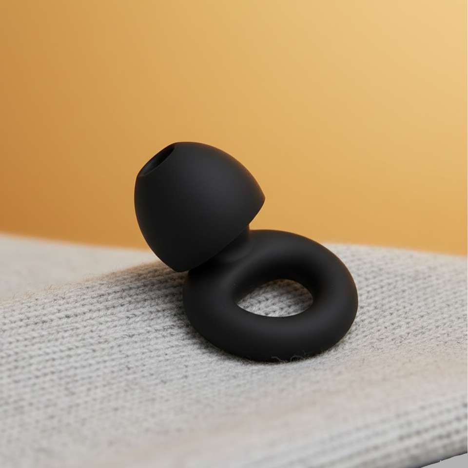 hello calm earplug sitting on a cloth