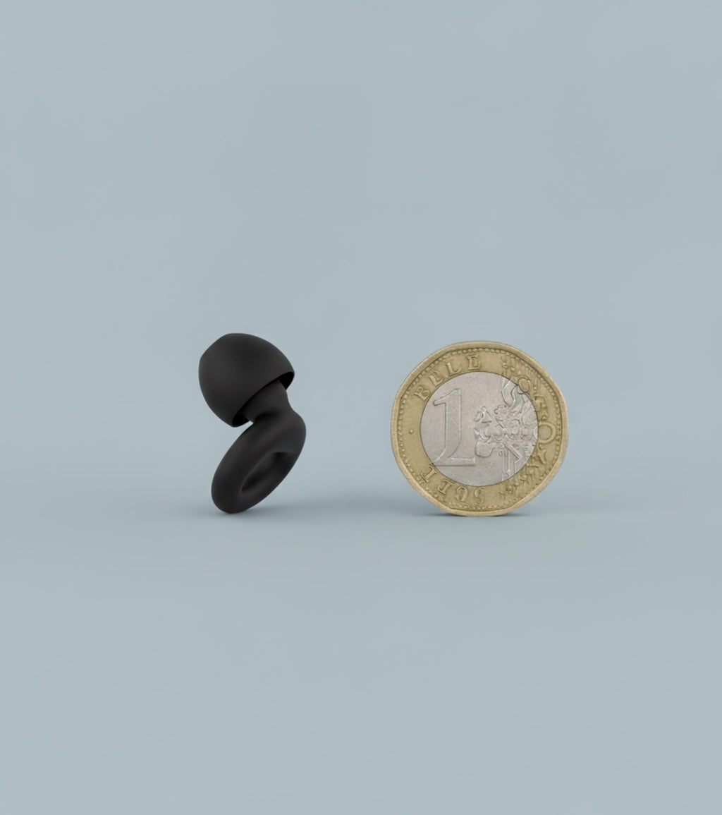 hello calm earplugs offering a personal sanctuary of quiet and peace, showing the size comparison to a pound coin.