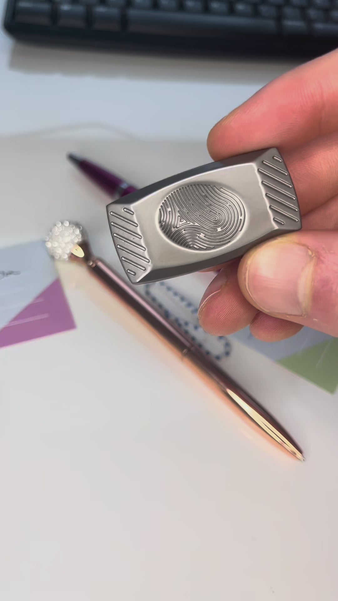 a video of the hello calm finger print slider fidget toy